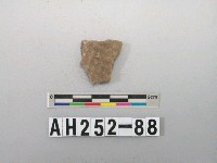 藏品(紅色夾砂印紋陶片)的圖片